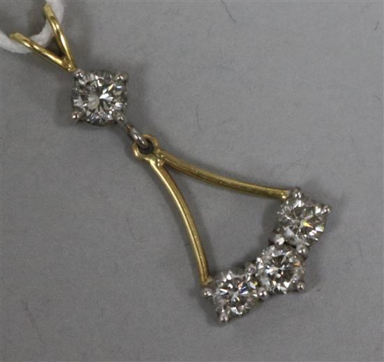 A gold and four stone diamond set drop pendant, overall 3cm.